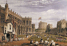 A painting showing a stone chapel on the left, with a timber built entrance, out of which are parading a number of white clad individuals. In the middle of the painting is a grassy area, across which are marching various red-uniformed soldiers. On the right hand side is a line of stone buildings, with a circular tower on a mound in the far distance.