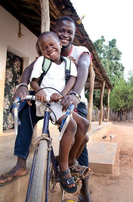 3 boys on a bike