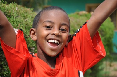 Cheering child, Ethiopia