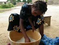 Sahel Emergency Appeal: A young person with a bowl of food