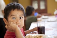 Peruvian boy with coke glass (Chavin)