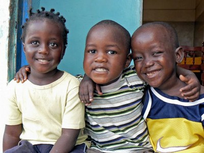 Three children from Bakoteh in the Gambia