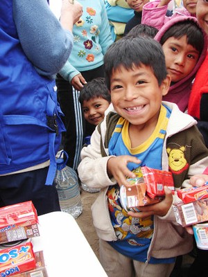 Aid being given to children following earthquake in Peru 2008 ERP